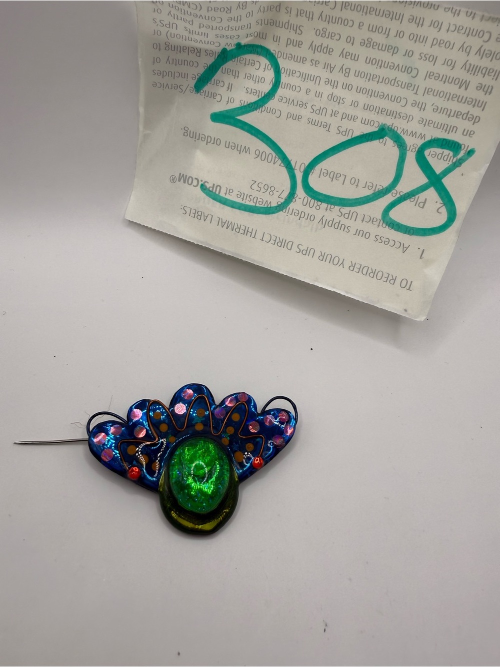 Iridescent Blue Wrist Pin with Green Accent - Unbranded
